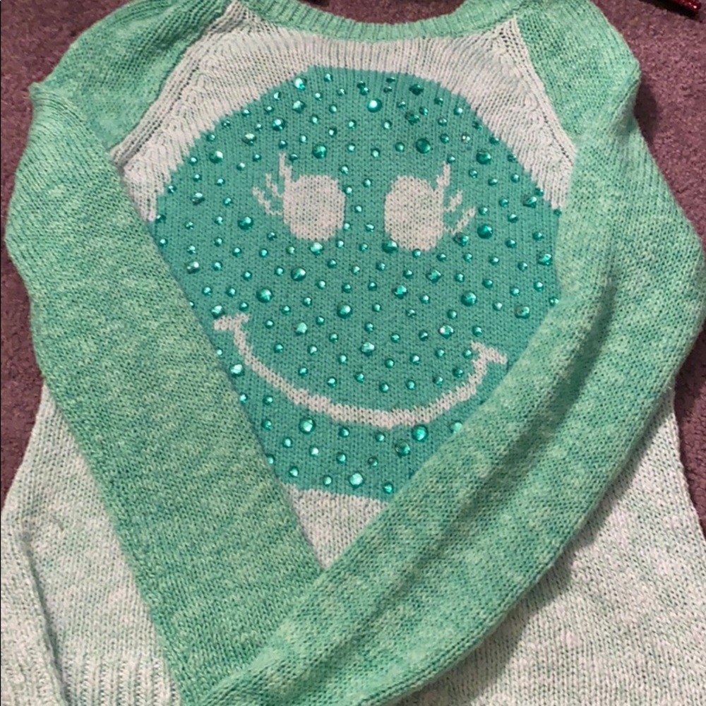 Blue knitted sweater